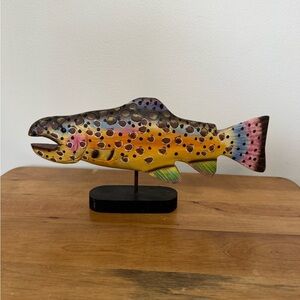 Vintage hand-carved and hand-painted wooden brown trout figurine on a stand
